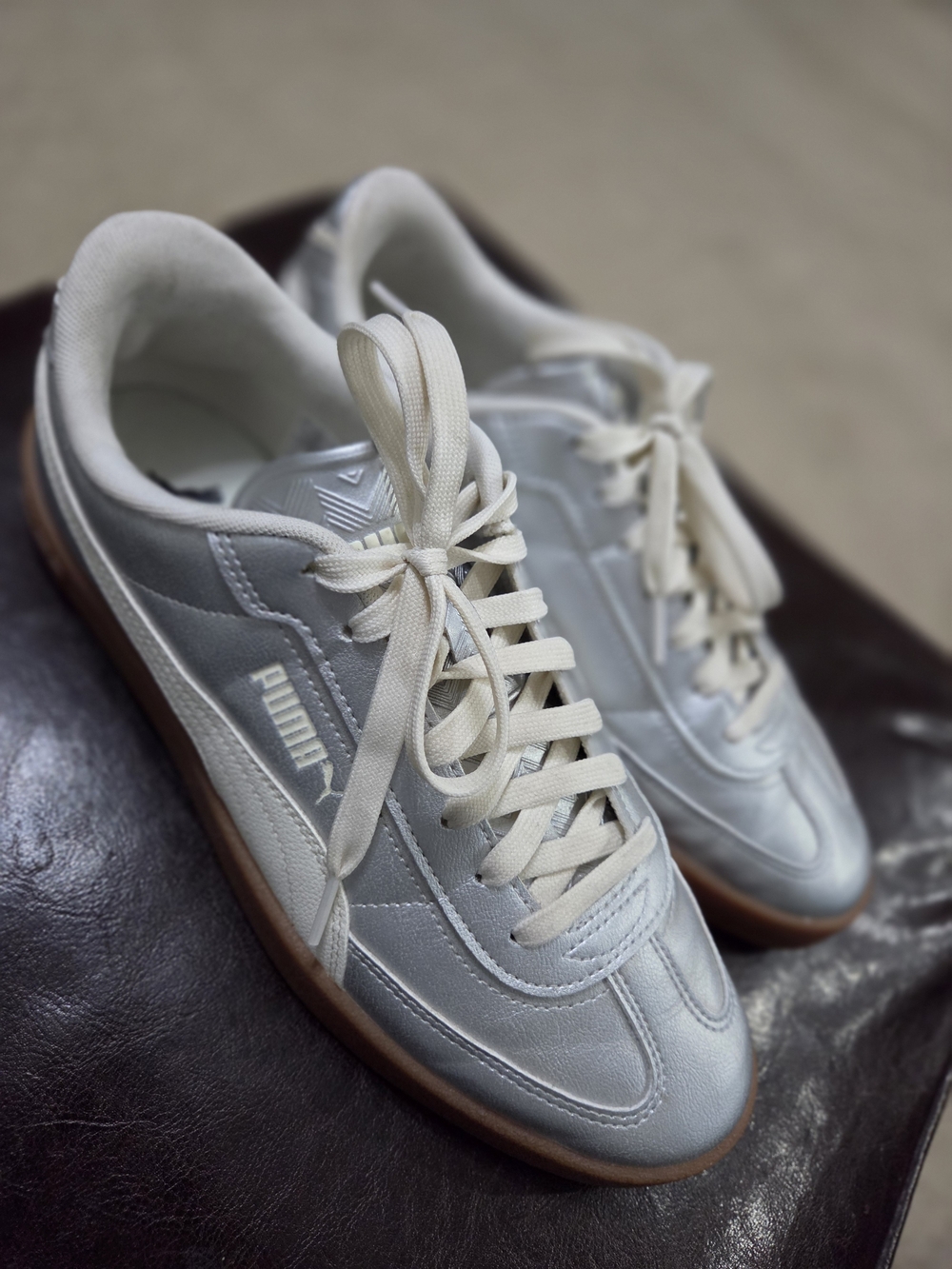 Puma Women’s Classic Lace-Up Sneakers in Light Silver and White